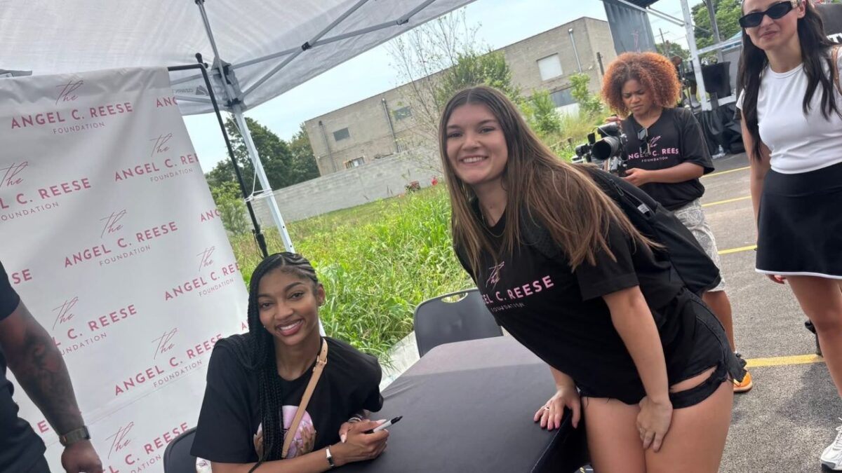 Angel Reese working with her foundation