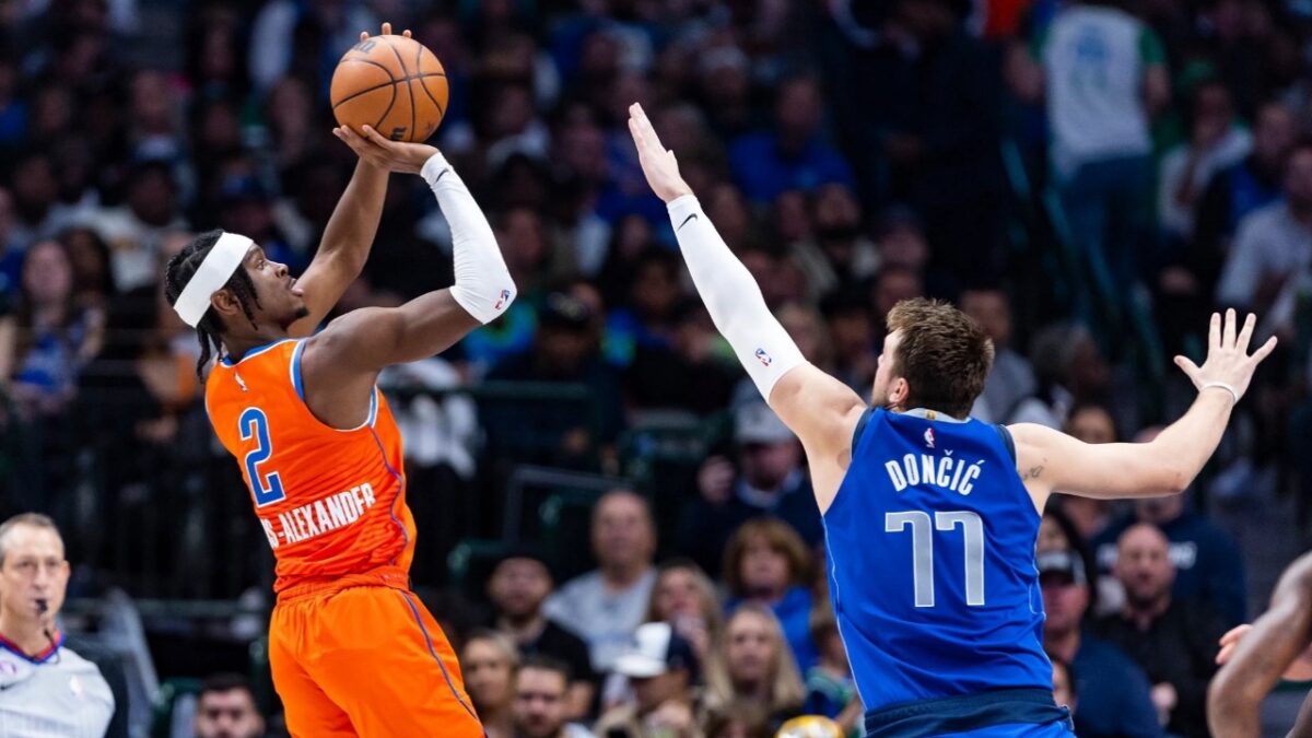 Shai Gilgeous-Alexander shooting over Luka Doncic