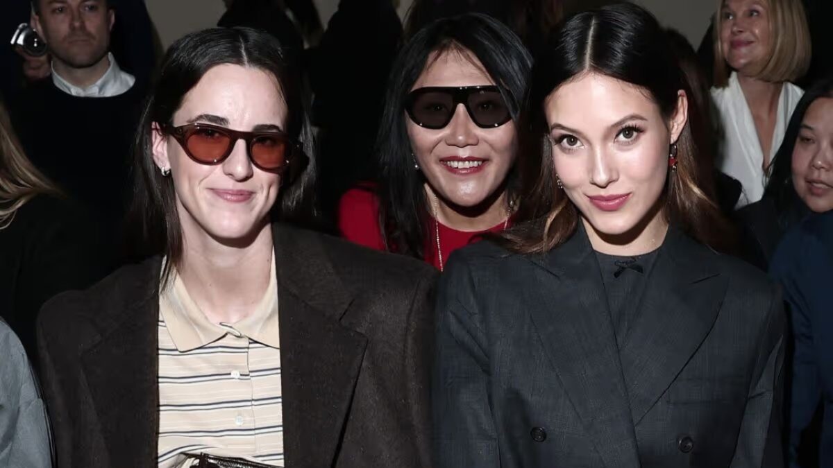 Caitlin Clark and Eileen Gu seated front row