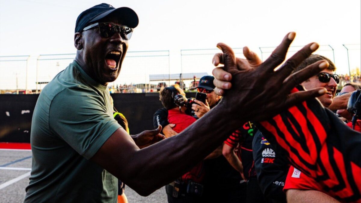 Michael Jordan Names Denny Hamlin as the “Mastermind Behind” Tyler Reddick’s NASCAR Domination 1 Michael Jordan celebrating with his 23XI Racing crew