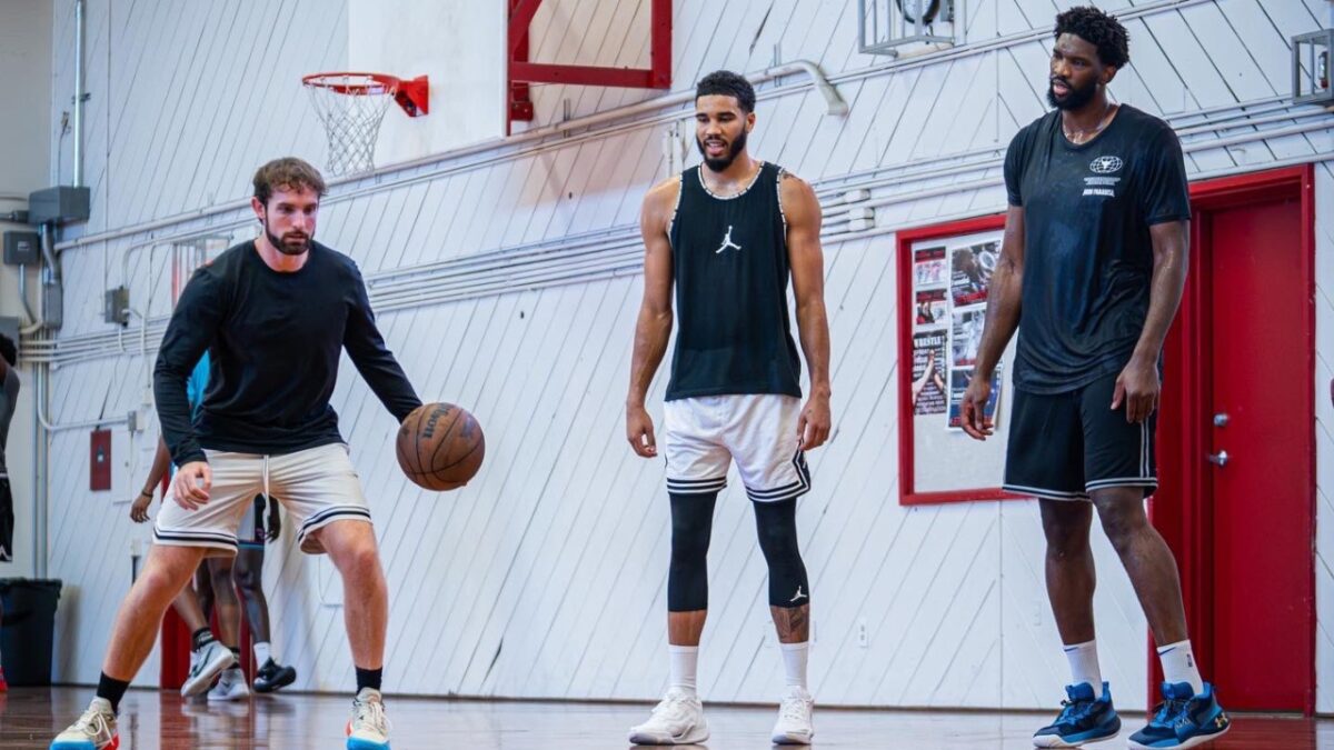 Drew Hanlen (left), with clients, Jayson Tatum and Joel Embiid