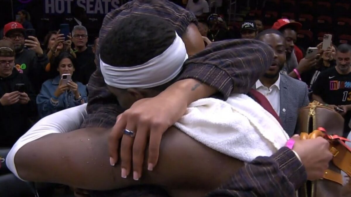 Bam Adebayo hugging A'ja Wilson