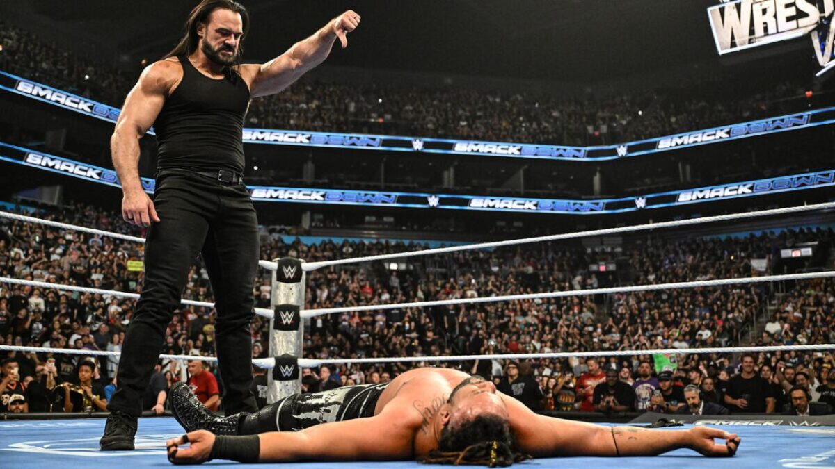 Drew McIntyre standing tall over Jacob Fatu