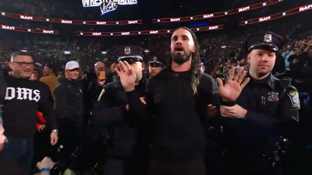 Seth Rollins in the custody of the cops on Raw
