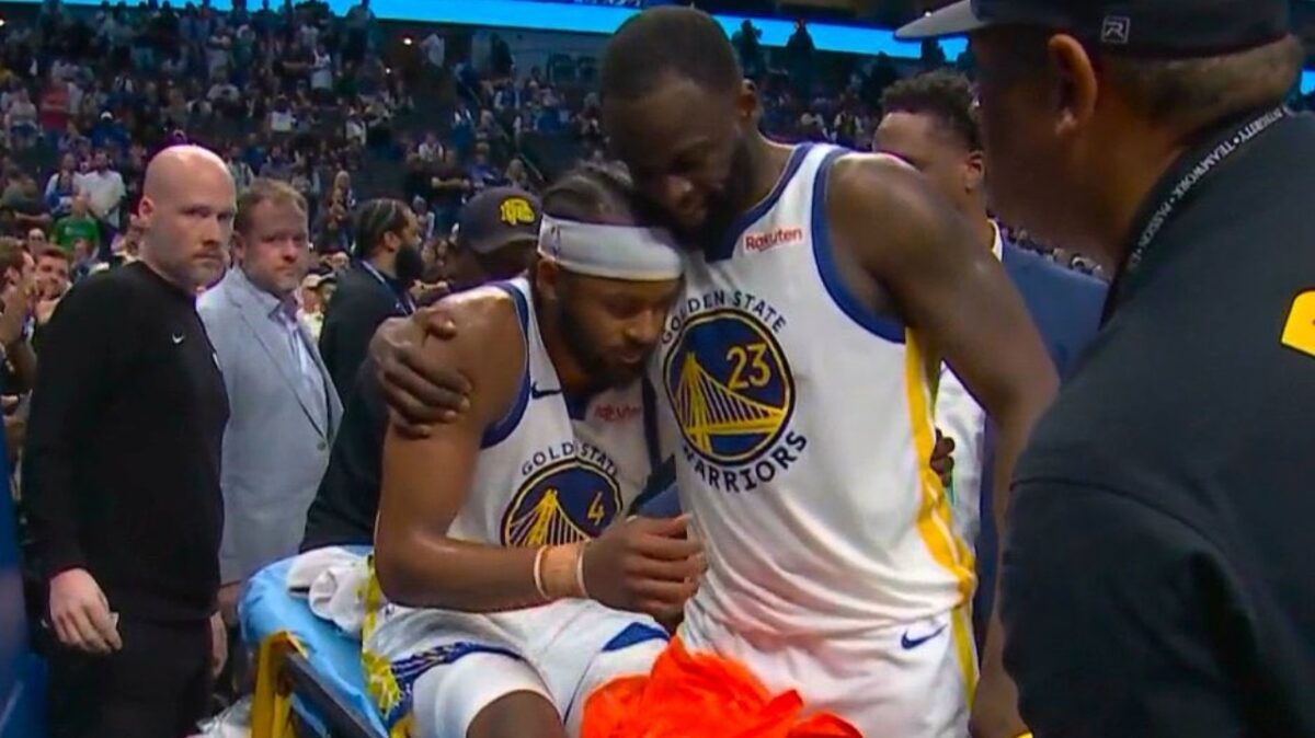 Draymond Green hugging Moses Moody after his injury