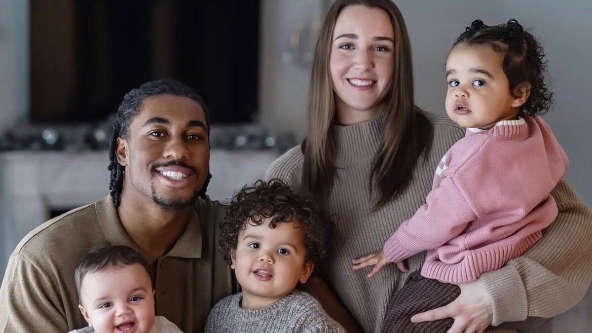 Jaden Ivey, his wife Caitlyn Ivey, and their three children