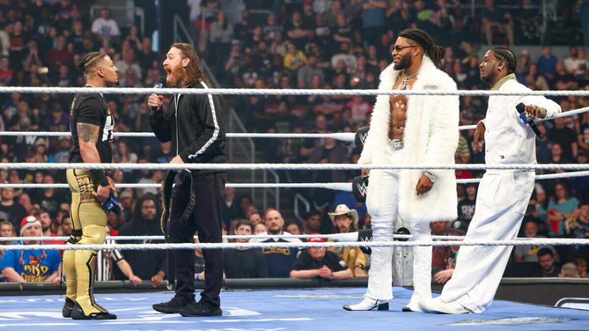 Carmelo Hayes' WrestleMania 42 Hopes Dashed After Sami Zayn Loss on SmackDown 1 Carmelo Hayes and Sami Zayn going at it with Trick Williams and Lil Yachty watching