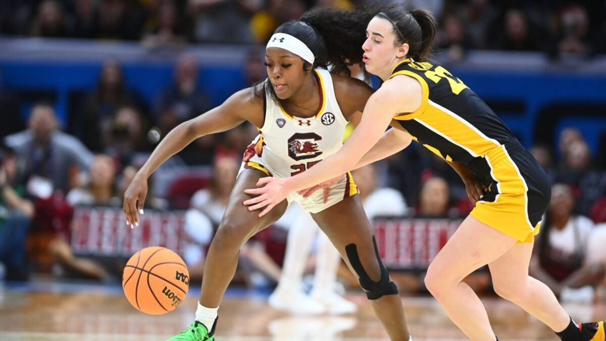 Raven Johnson and Caitlin Clark battling in the 2023 Final Four