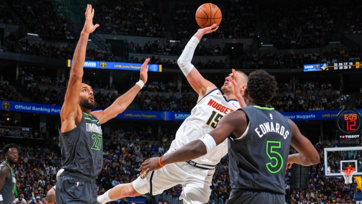 Nikola Jokic scoring a ridiculous shot