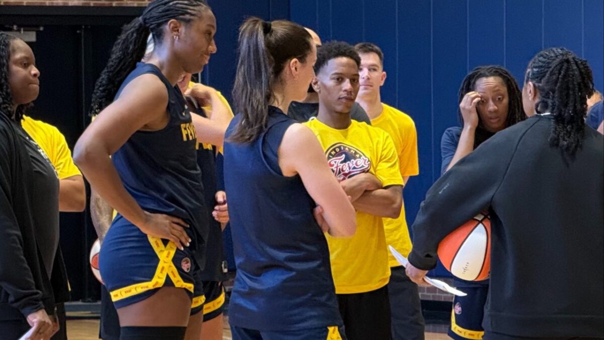 Caitlin Clark and her teammates at the training camp