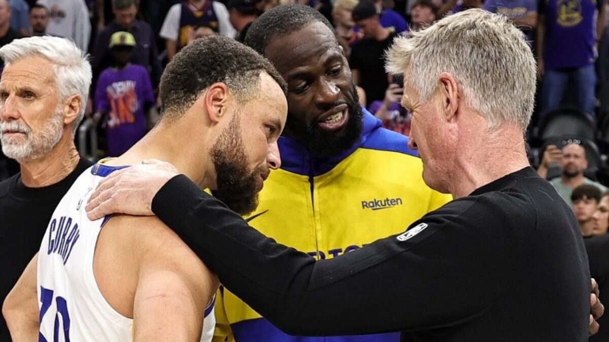 Stephen Curry, Draymond Green, and Steve Kerr huddling after their last game