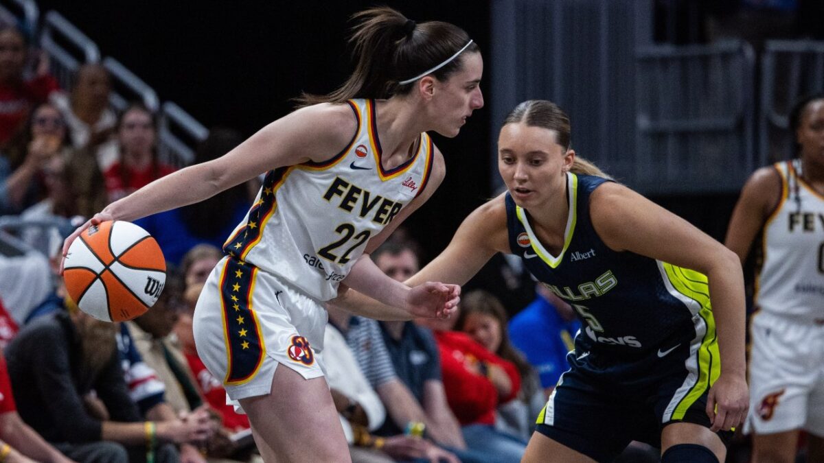 Caitlin Clark battling Paige Bueckers