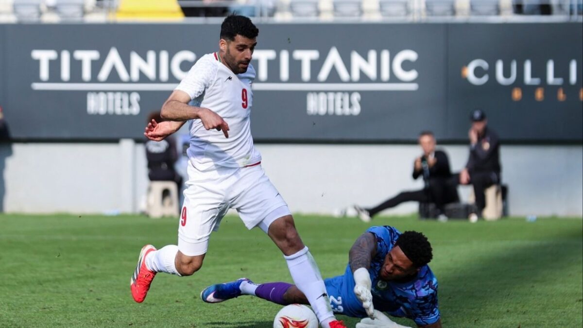 Symbolic Pin on Iran's World Cup Uniforms Raises Tensions Ahead of The FIFA World Cup 2026 Kickoff 1 Mehdi Taremi, captain of the Iran football team, in action during a friendly in March (Image via EPA)