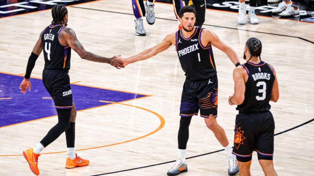 Devin Booker’s Switch to Melvin Booker's No. 15 Jersey Turns Father’s Day Into an Emotional Moment 1 Devin Booker and his teammates will rely on their chemistry next season