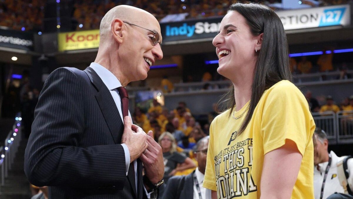 Caitlin Clark Has Become a 'Political Football,' Says Adam Silver 1 Adam Silver joking with Caitlin Clark at the 2025 NBA Finals