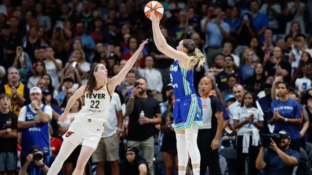 Caitlin Clark's Angry Reaction to Paige Bueckers' Foul Goes Viral 1 Clark and Bueckers battling