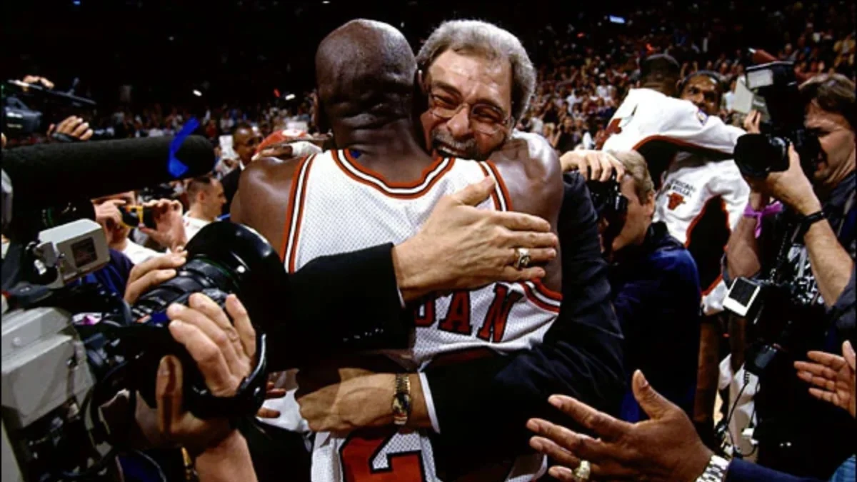 Darko Rajakovic Compares Scottie Barnes to Michael Jordan 1 Michael Jordan and Phil Jackson hugging each other after winning the championship