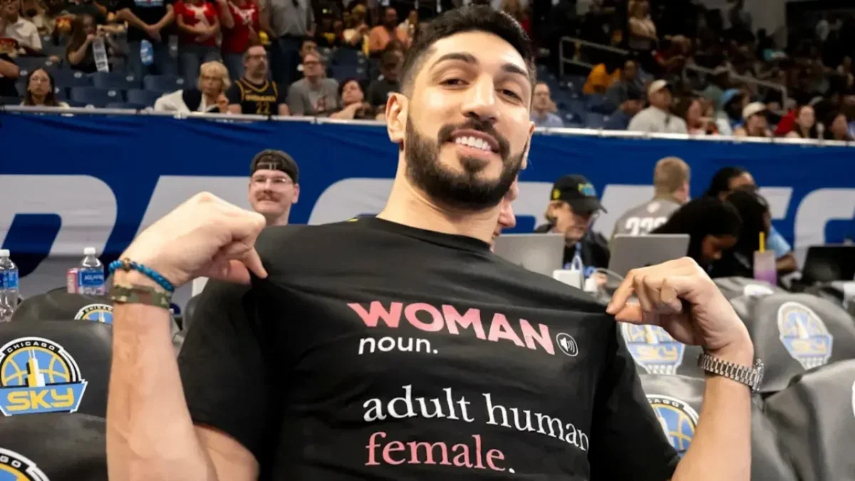 Enes Kanter Freedom Gets Thrown Out of Fever-Sky Clash After Natasha Cloud Confronts Him Courtside 1 Enes Kanter Freedom displaying his shirt