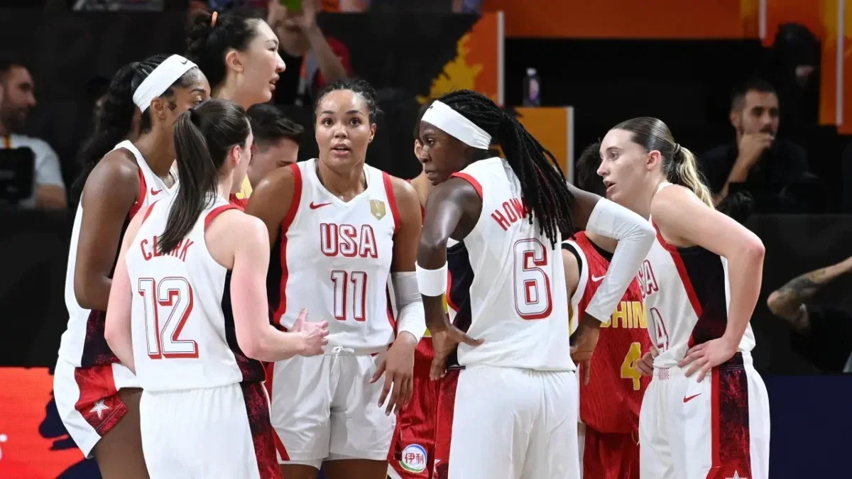 'Humble' Caitlin Clark Gives USA Basketball Teammates Props After Record-Setting 11 Assists 1 Team USA players listening to point guard Caitlin Clark