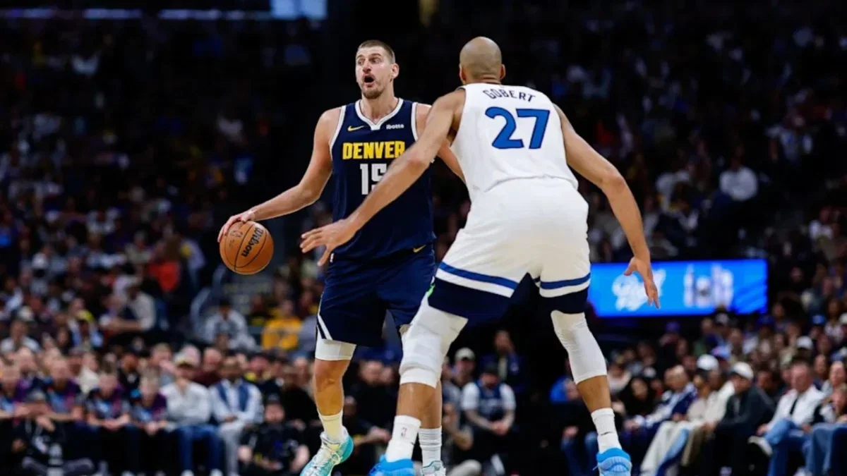 Nikola Jokic Questions Whether Athletes Should Be Role Models for Young Fans 1 Nikola Jokic being defended by Rudy Gobert