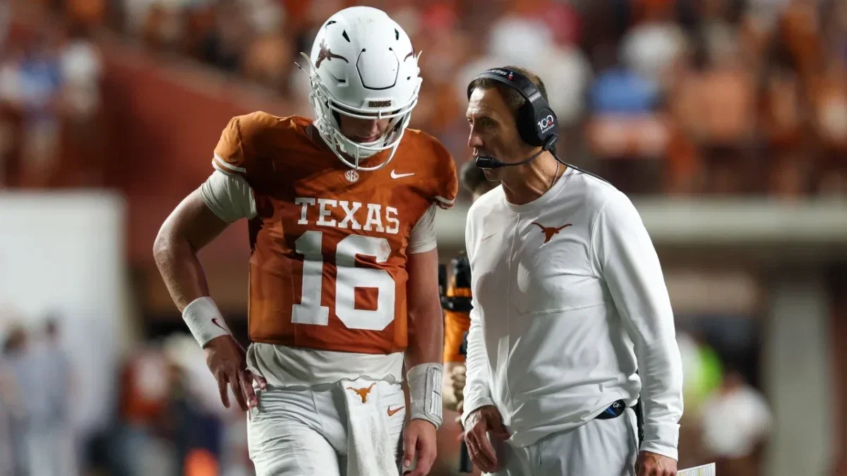 Arch Manning Apologizes to Holly Rowe After Insensitively Mocking Reporter's AI Slap Video 2 Arch Manning & head coach Steve Sarkisian