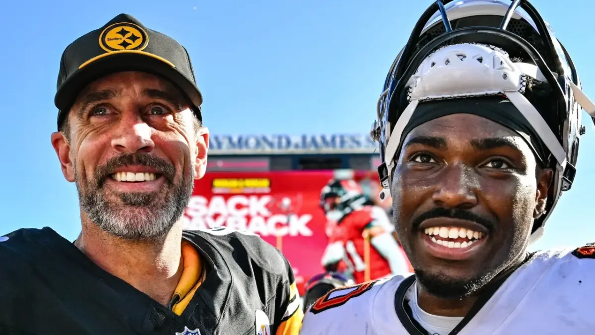 Aaron Rodgers' Soft Side on Display as He Spends Time with Nieces & Nephew, Swaps Jerseys with Bucs Rookie QB 1 Aaron Rodgers and Jalon Daniels