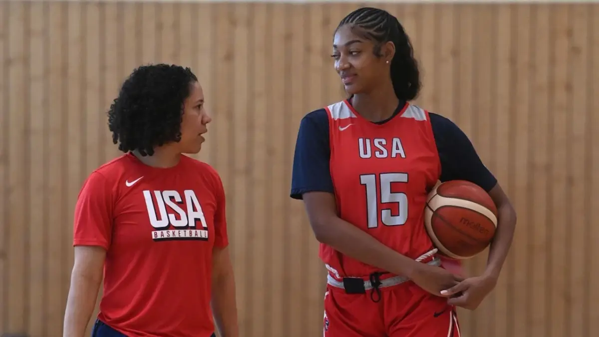 Angel Reese’s Powerful Message After Dream Takes 2-1 Finals Lead: "I'm Not Letting You Take This From Us" 1 USA Basketball HC Kara Lawson with Angel Reese